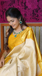 Beige Banarasi Silk Woven Design Saree With Gold Zari Weaving
