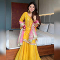 Women's Mustard Yellow Faux Georgette Embroidered Sharara Set with Contrast Pink Dupatta