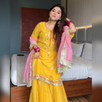 Women's Mustard Yellow Faux Georgette Embroidered Sharara Set with Contrast Pink Dupatta